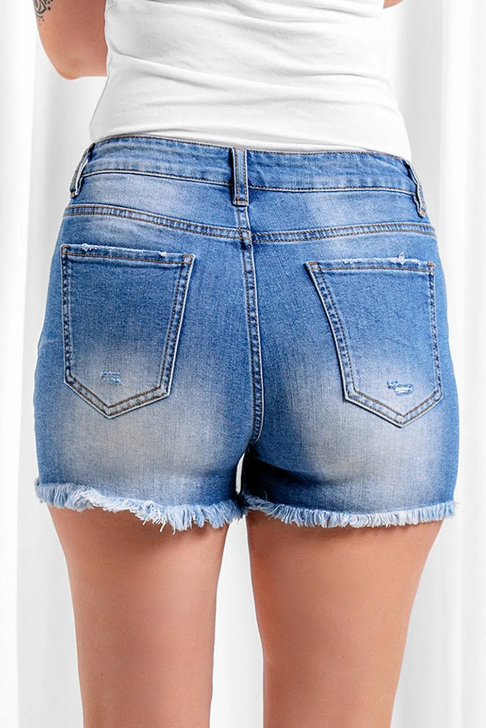 Exposed Button Fly Raw Hem Denim Shorts