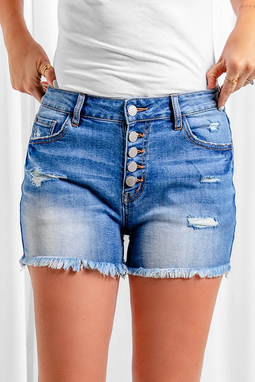 Exposed Button Fly Raw Hem Denim Shorts